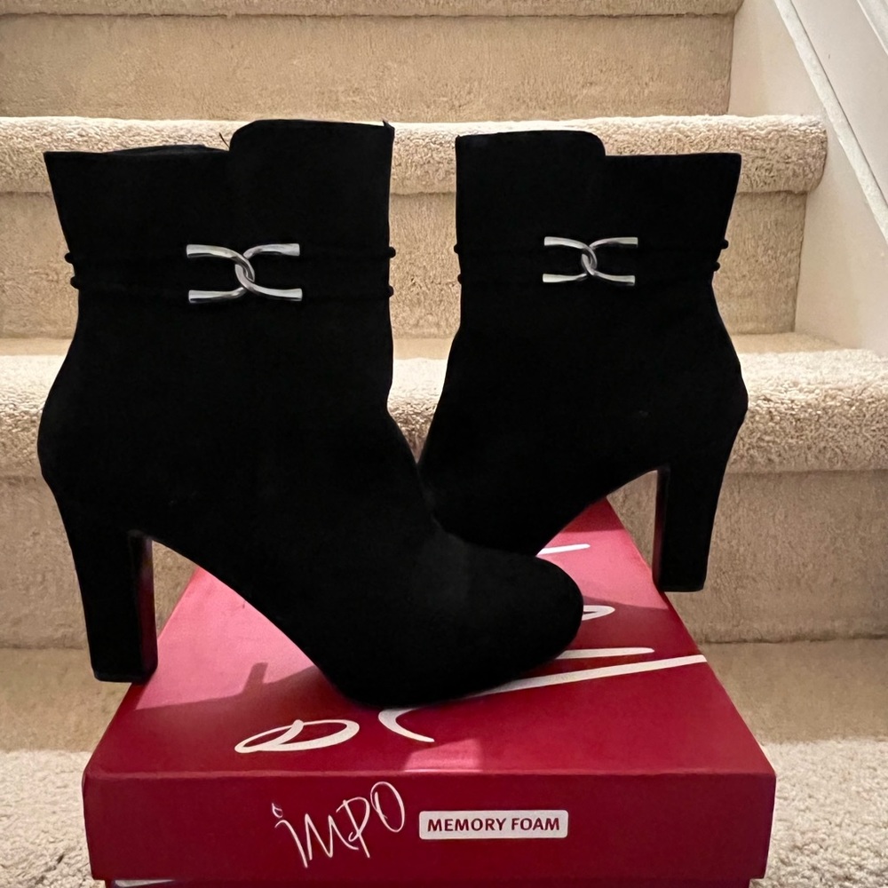 Black suede booties, never worn.